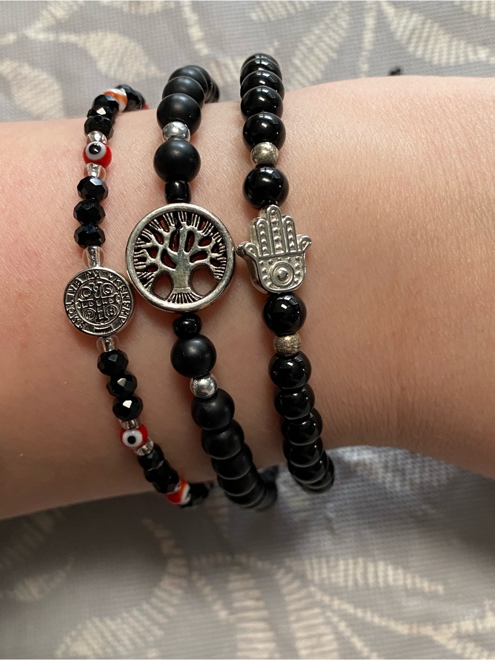 Black Beaded Bracelet Stack with Silver Hamsa & Tree Charms